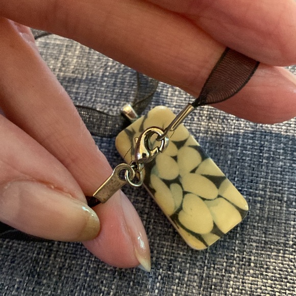 Handmade Necklace Made With A Domino Ribbon Silver Colored Hardware - Picture 9 of 13